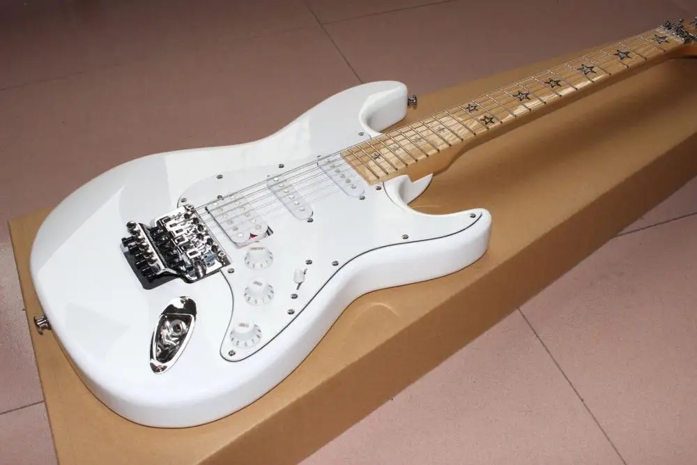 

Electric Guitar with white color,maple fingerboard.high quality pickups,with white color hardware guitarra