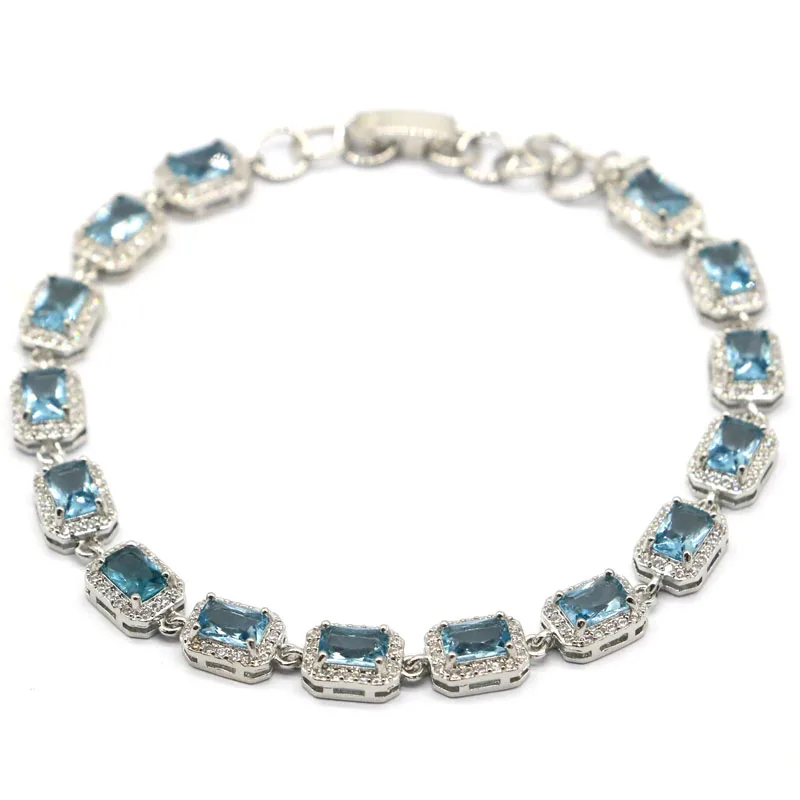 Женский серебряный браслет SheCrown Created London Blue Topaz с белым фианитом 12x7 мм 7 5 8
