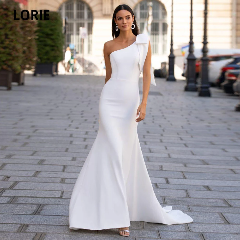 Lorie Soft Satin Mermaid Trouwjurken Sexy Een Schouder Mouwloze Bruidsjurk Wit/Ivoor Strand Bruiloft Jurk Met boog Lorie Soft Satin Mermaid Trouwjurken Sexy Een Schouder Mouwloze Bruidsjurk Wit/Ivoor Strand Bruiloft Jurk Met boog