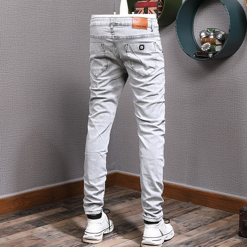 Streetwear moda uomo Jeans Jeans strappati Slim Fit elastici bianchi grigi chiari  uomo pantaloni a matita in Denim Casual firmati in stile coreano|Jeans| -  AliExpress