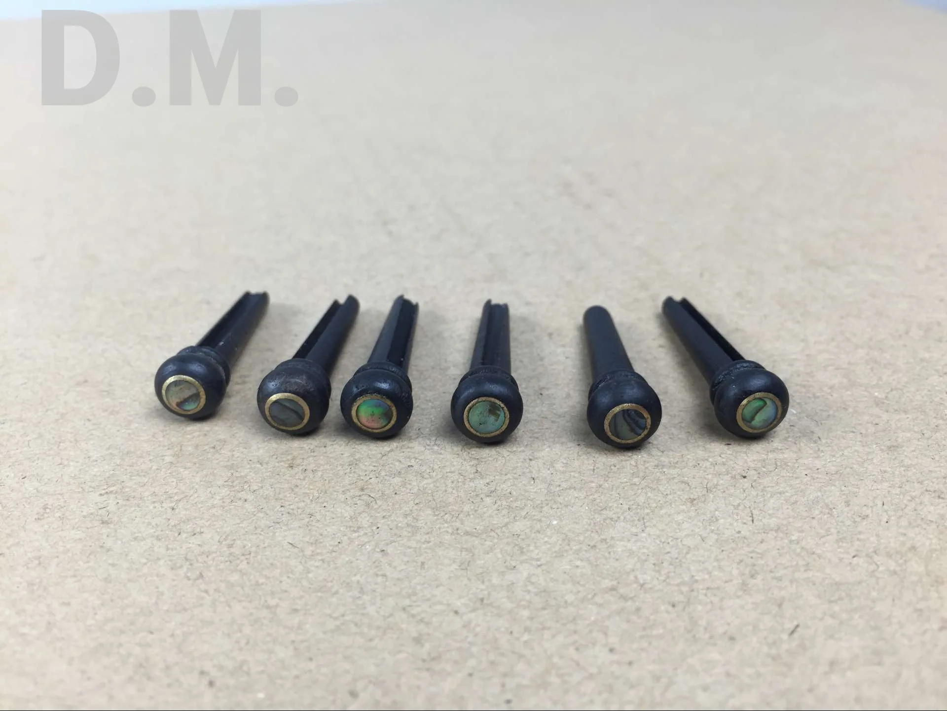 Factory Direct Selling Customizable Top Grade Guitar Strings Cone Ebony Material zhen bei Solid String Nail Black And White with