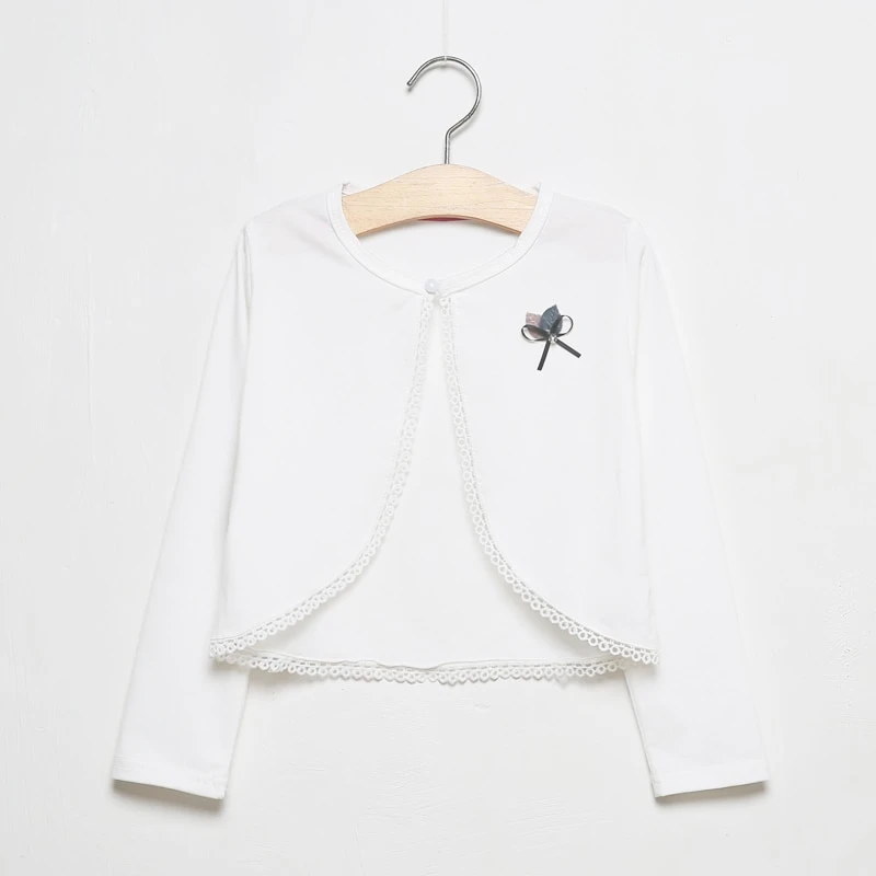 white shrug sweater