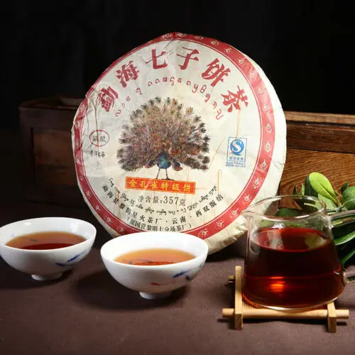 

2010 Liming Golden Peacock Tea Premium Menghai Ripe Shu Pu-erh Cake 357g