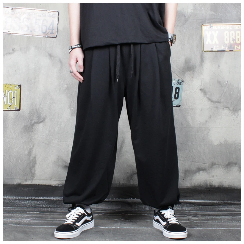 

Японские шаровары Harlan с завязками на завязках, мужские широкие брюки с драпировкой размера плюс, трендовые свободные шаровары в стиле хип-хоп