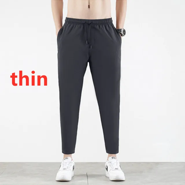 2022 New Korean Ice Silk Elastic Trousers Four Seasons Thin Casual Men'S Loose 9-Point Large Size Small Foot Sports Pants Spring dark grey