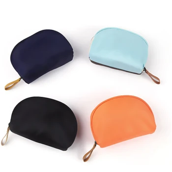

Travel Mini Cosmetic Bag 2020 New Nylon Waterproof Zipper Shell Shaped Clutch Purse High Quality Solid Makeup Storage Bag