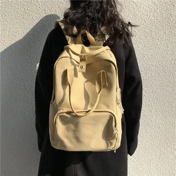 

New Hong Kong style canvas schoolbag female Korean student simple solid color junior high school student large capacity backpack
