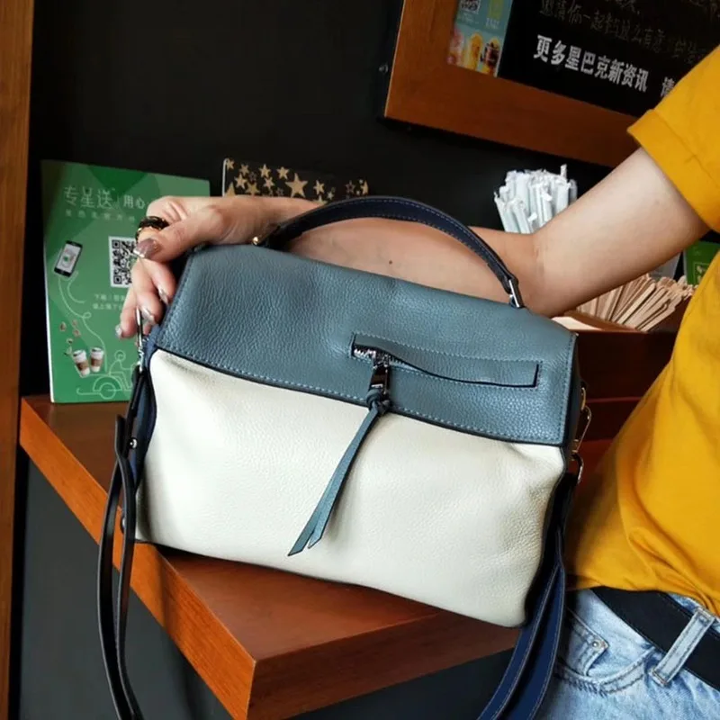 

Leather Women's Bag 2019 New Fashion Hand Bill of Lading Shoulder Slung Satchel.