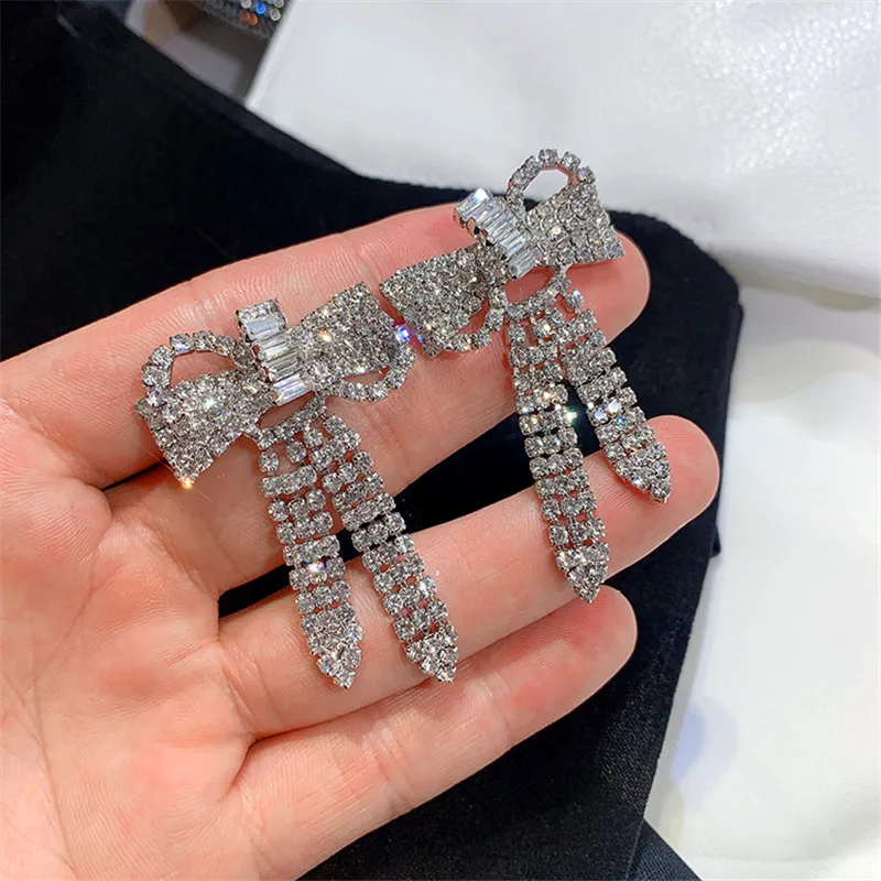 

Cute Female Silver Gold Bowknot Earrings Fashion Crystal White Zircon Drop Earrings Trendy Party Long Dangle Earrings For Women