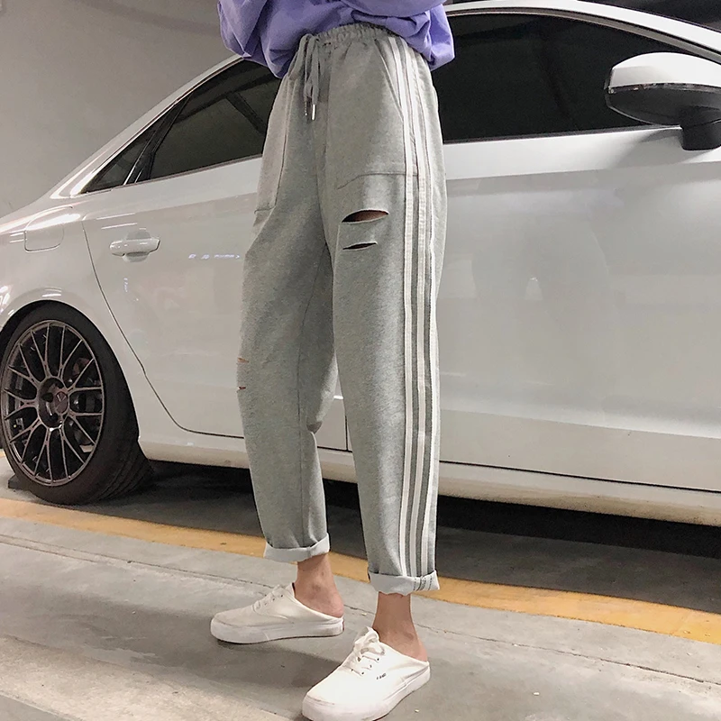 

women trousers 2019 autumn Korean streetwear modish harajuku ripped sweatpants sportwear loose casual high waist harem pants