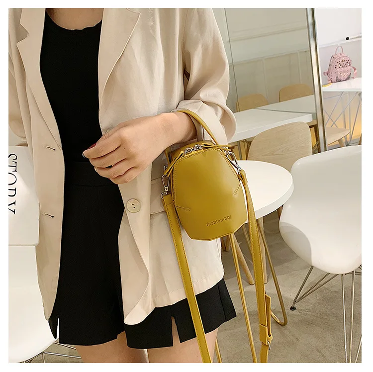 

2019 New stereo irregular bucket bag double zipper single shoulder slant slant women's bag