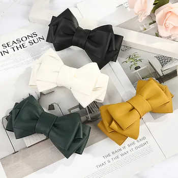 

Ladies New Automatic Clip Leather Temperament Pure Color Texture Bow Hair Clip GRS