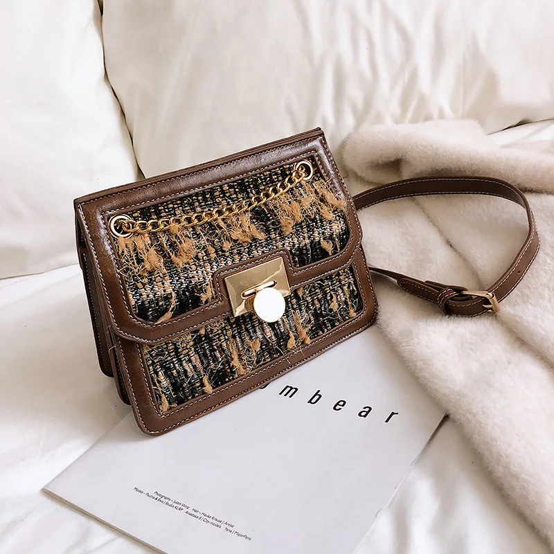

Korean version of three-dimensional Mao wind double pocket big square bag lock buckle single shoulder oblique span girl bag
