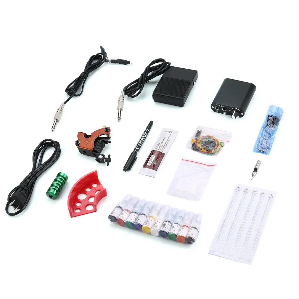

Complete Tattoo kits Pro Gun machine Power Pedal 10 Color ink sets power supply disposable needle Grip Tip US Plug Hot New