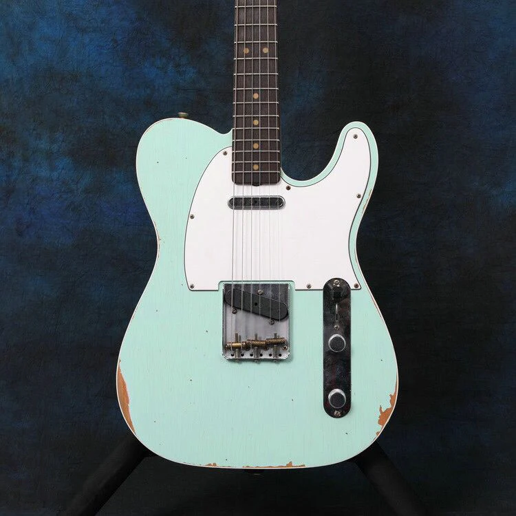 

Blue color Relics Electric Guitar with 6 stings, Rosewood fingerboard.Relics by hands guitarra.high quality pickups.real photos
