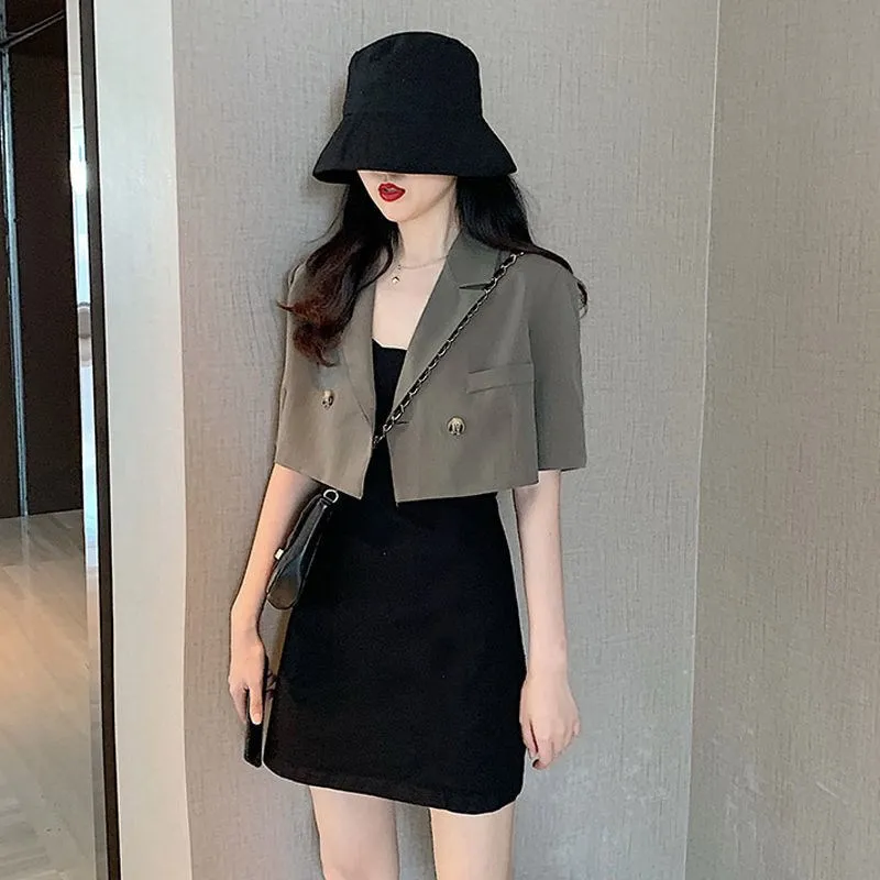 Stylish woman wearing a notched Korean-style cropped blazer in bold colors dark khaki