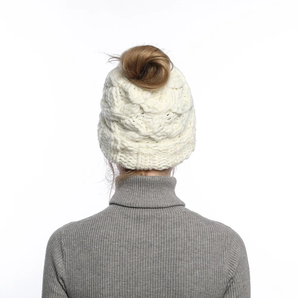 autumn and winter women's new knitted ponytail hat hair hair with an empty top hats head hats thickened to keep warm