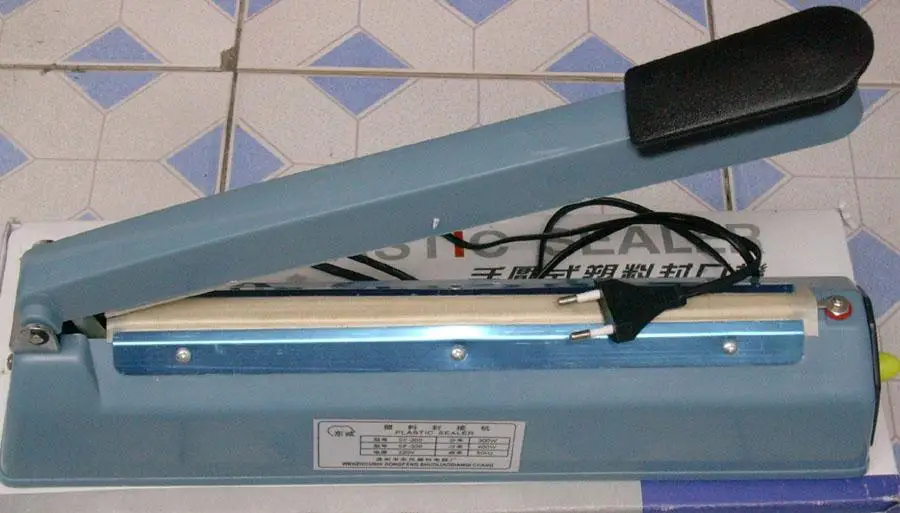 

Free Delivery.Hand pressure film sealing machine plastic film sealing machine, sealing machine (300)