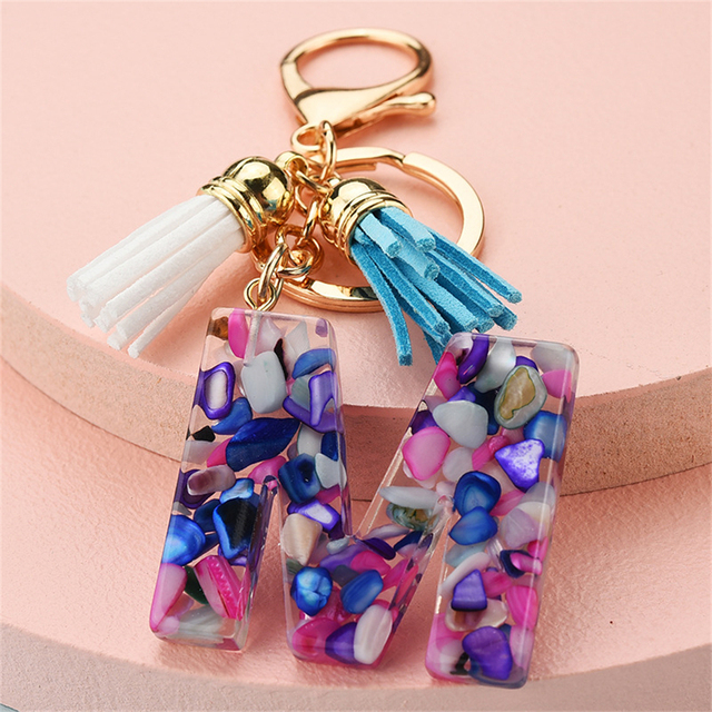 Women Keychains 26 Glitter Hollowed-out Words Handbag Tassel English Letter Keyring with Puffer Ball Charms Free Shipping