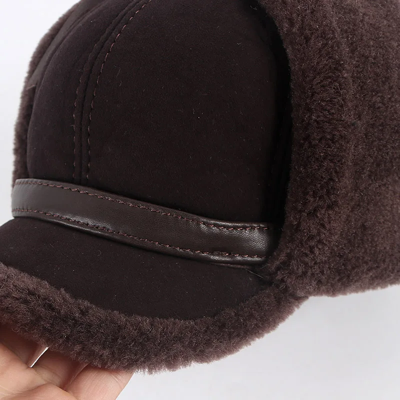 High Quality Real Fur Hat Lamb Wool Winter Bomber Hats For Men Earflaps 2021 Luxury Autumn Warm Ushanka Russian Hat Snow Cap best men's bomber hats