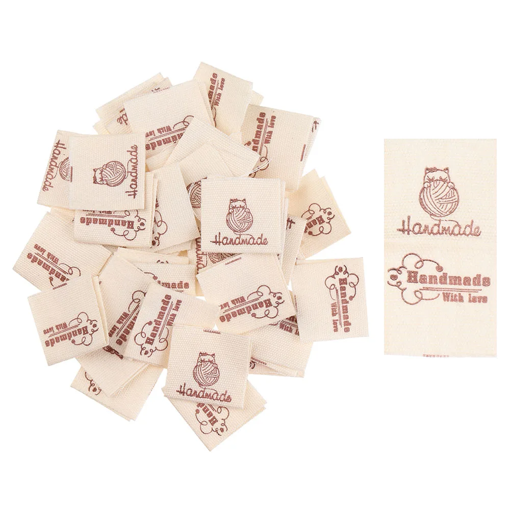 Description Picture 4 of item50PCS Handmade With Love Cloth Garment Labels Cartoon Cat Woven Knitted Supplies Heart Pattern Clothing Tags Sewing Accessories