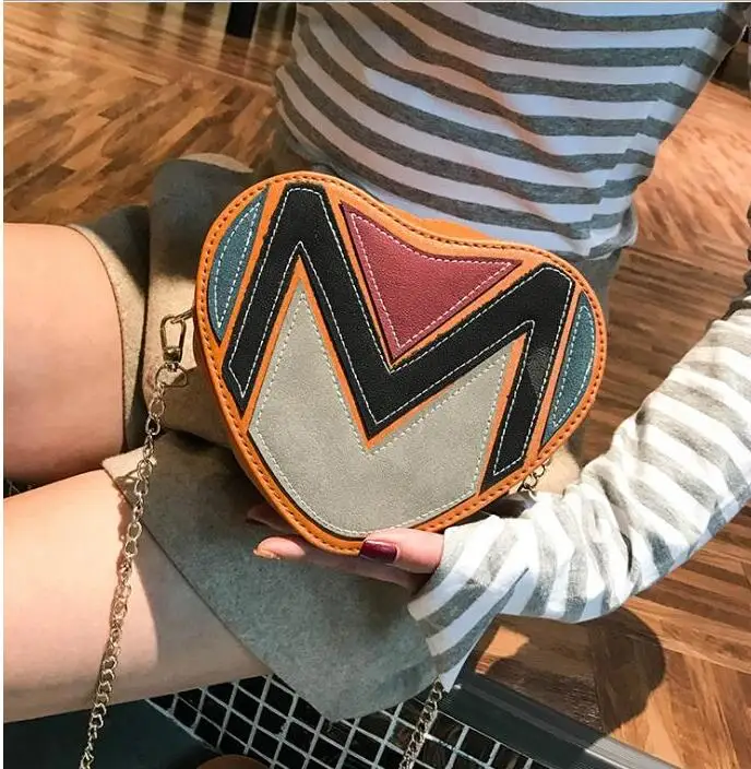 2020 brit New fashion single shoulder bag across zero purse bag, cool womens bag messenger bag peach heart chain