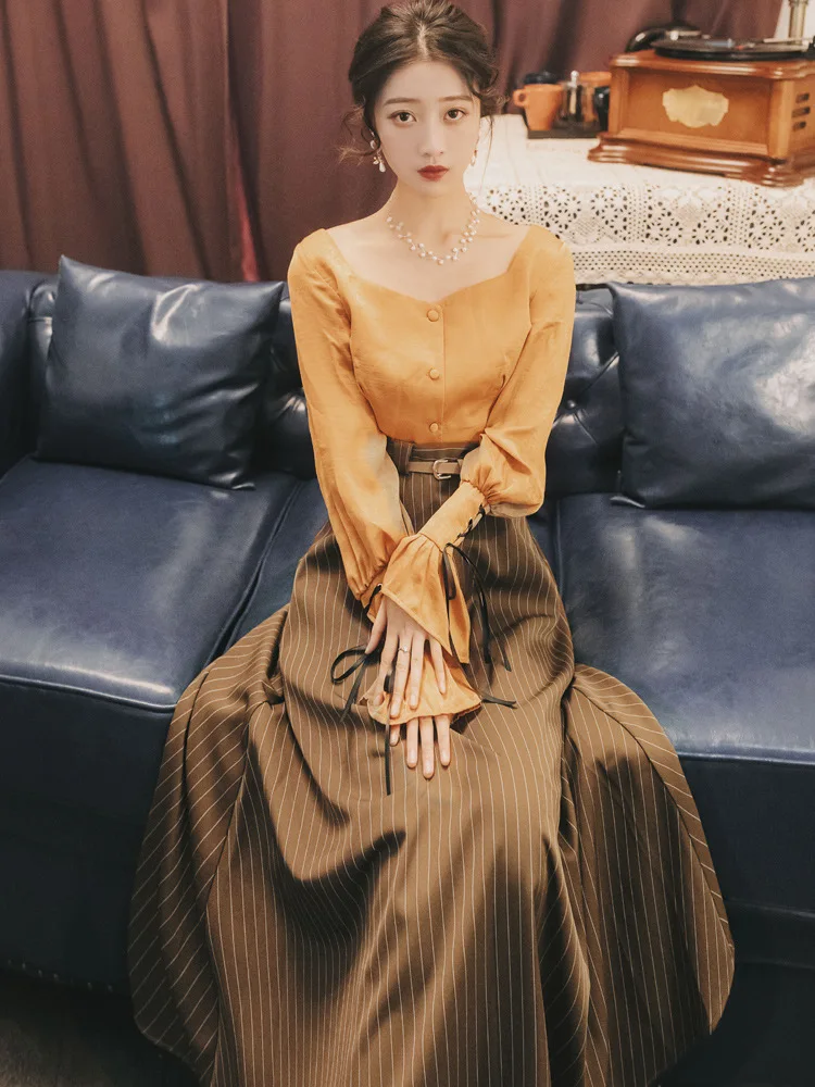 

French Vintage Lantern Sleeve Lace-up Palace Tops + England Retro High-waisted Stripes Skirt Set