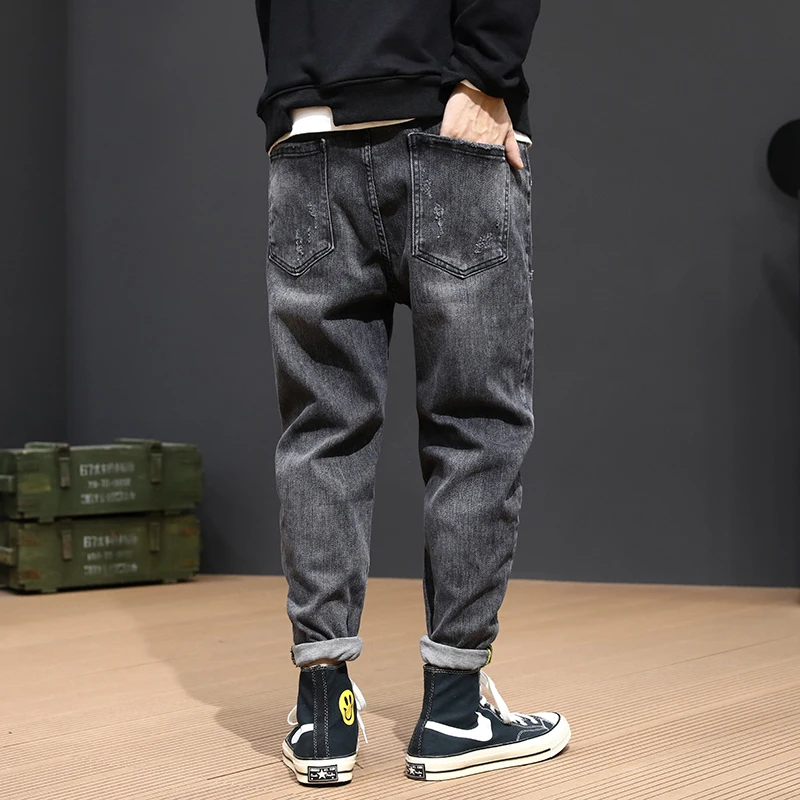Flash Sale Fashion Streetwear Men Jeans Loose Fit Black Gray Harem Pants High Quality Korean Style Hip Hop Ripped Jeans Men Pencil Pants