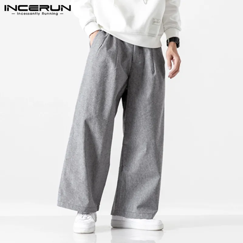 

Men Zipper Loose Trousers INCERUN Leisure Solid Color Pants Autumn Pockets Wide Leg Trousers Vintage Breathable Mens Pants SXL