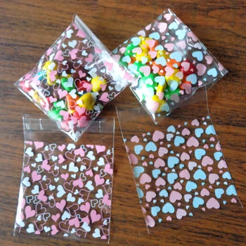 

100pcs Pink Blue Heart Plastic Bags Thank you Cookie Candy Bag Self-Adhesive Party Gift Bag Stationery Packaging Envelopes