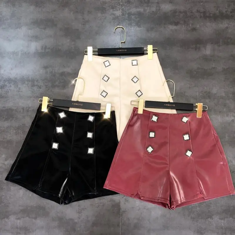 

2019 autumn new double drainage diamond buckle side zipper reflective coating shorts