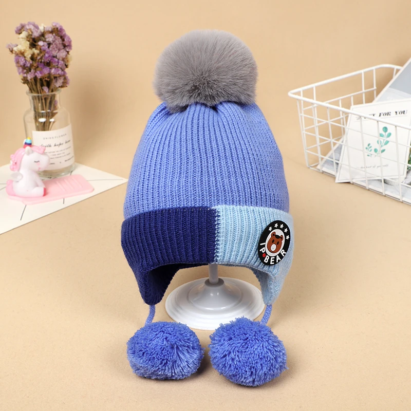 

Children's hats winter boys girls baby plus velvet earmuffs kids winter warm children's woolen hats