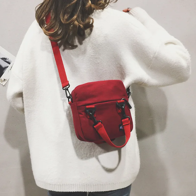 

2019 new JIULIN Korean version of solid color student shoulder simple canvas wild diagonal female bag