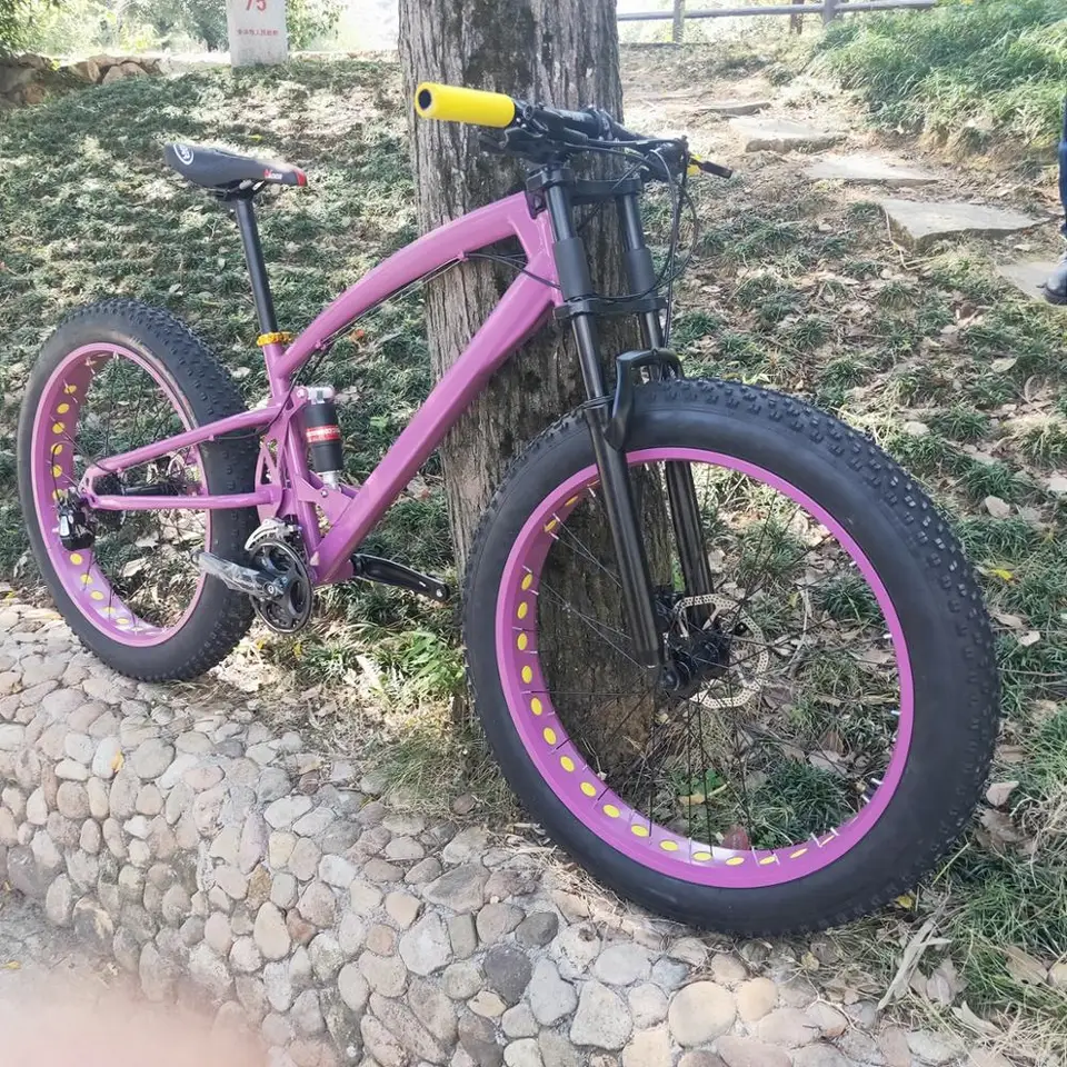 purple full suspension mountain bike