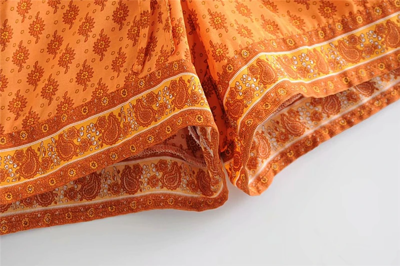 Boho шикарные летние женские цветочные печати пояса Boho комбинезоны дамы V образным вырезом с длинным рукавом кисточкой пляжные Комбинезоны Боди Топы