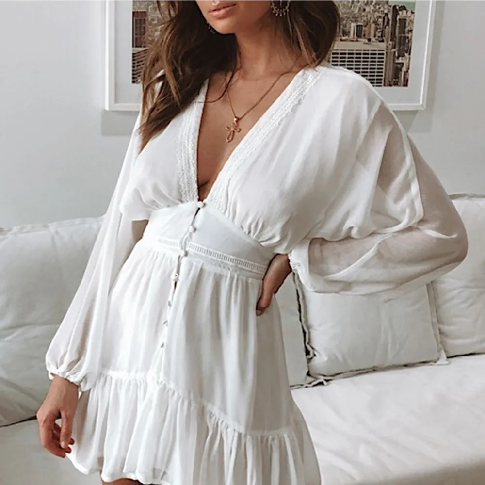white long sleeve ruffle dress