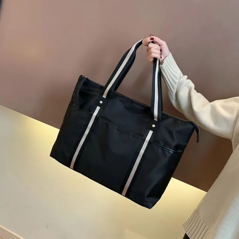 

Fashion ribbon travel bag Korean version of large-capacity handbag simple one-shoulder fitness bag new style