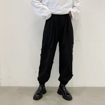 

Japan Style Men Casual Pants Loose Solid Hole Gothic Darkness Ro Oversize High Street Streetwear Harem Pants Jogger Elastic
