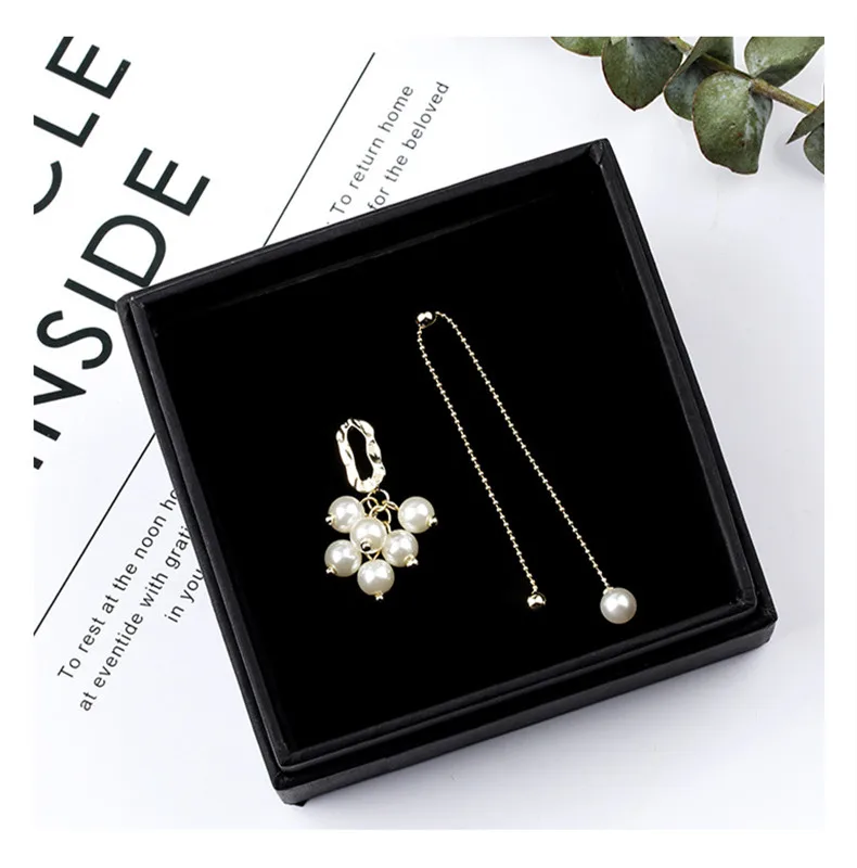 

Kyoko Korean version of the asymmetric earrings female pearl pendant tassel long ear temperament simple fashion earrings