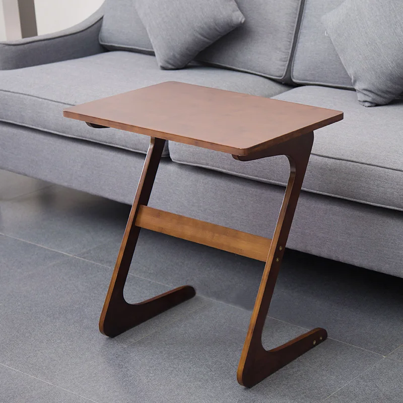 

The sofa table bedside table Z - type living room Nordic edge several sofa corner several beds can move the table to be simple.