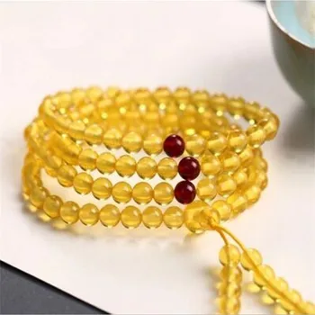 

Natural amber honey wax 6MM108 Buddha beads hand string Jinper three-way Buddha head ball bead multi-circle women's bracelet