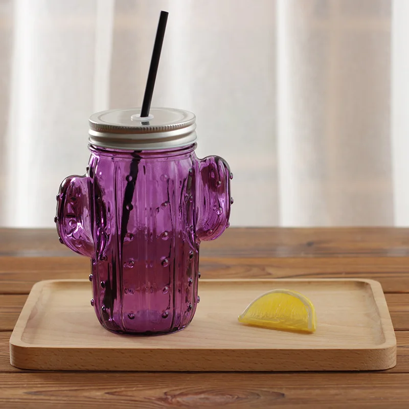 Violet glass cup with lid and straw on a white background isolated. Mason  jar with handle and screwed down cap. Empty mug no spill. Stock Photo