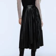 ZA женские осенние и зимние юбки из искусственной кожи с завышенной талией и асимметричным подолом, плиссированная юбка с боковой пряжкой
