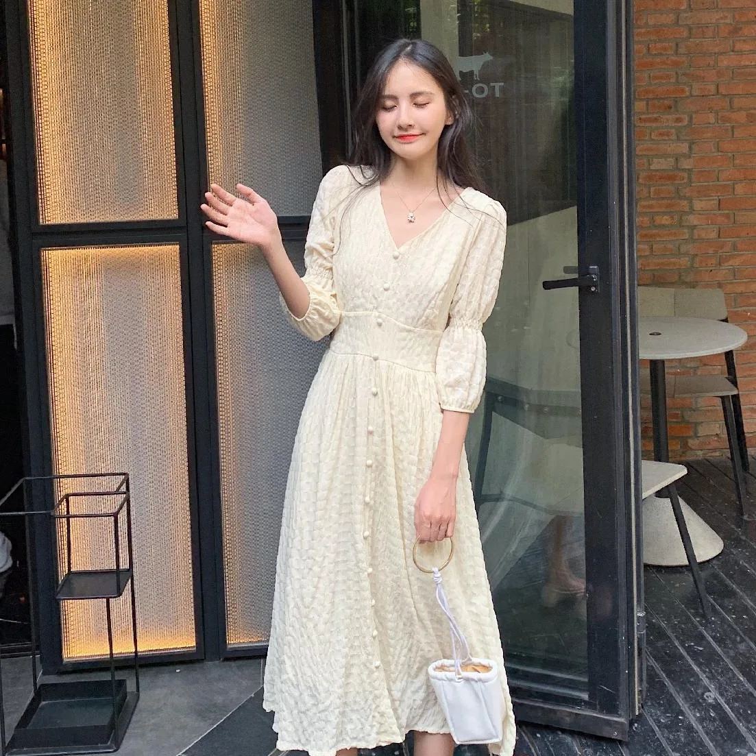 

Photo Shoot Gentle Wind Palace Puff Sleeve Apricot Long Waist Hugging Pleated V-neck Single Breasted Egg Big Hemline Dress Women