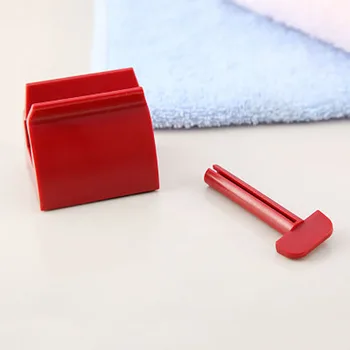 

1 pcs roller tube toothpaste extruder dispenser toothpaste stand roller bathroom set accessories