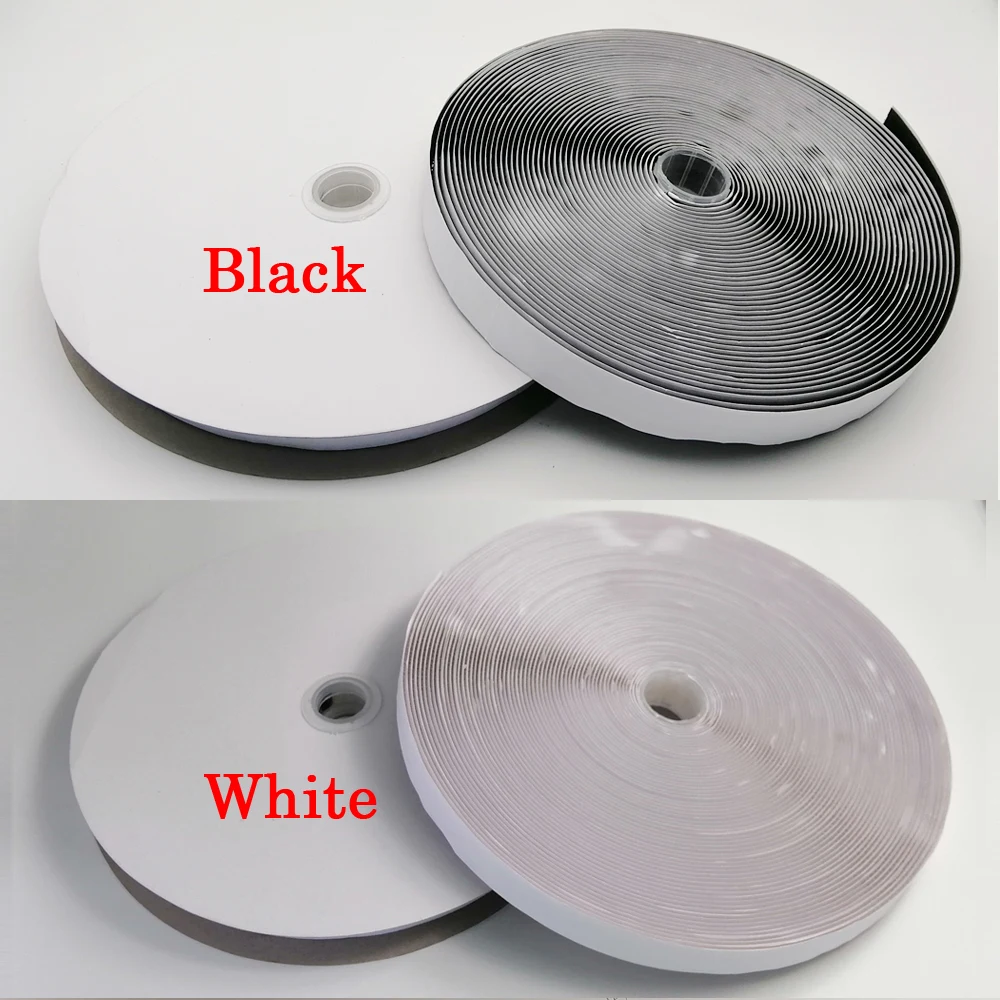 Two rolls of tape, one black and one white, on a white background.