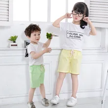 Пляжные шорты ярких цветов в Корейском стиле; Детские хлопковые льняные брюки; летние детские шорты для мужчин и женщин