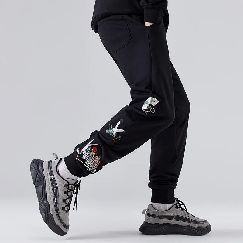 

2020 new Chinese style retro ethnic style loose large size beamed pants crane embroidery sports casual pants men's trend