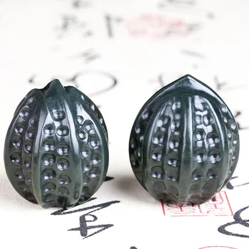 

Natural Xinjiang and Tian Qingyu carved walnut hand pieces