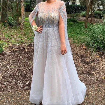 

Long Sleeves Celebrity Dress Elegant Beaded Sweep Train Red Carpet Formal Evening Gowns Sheer Back Designer Crystals Prom Wear